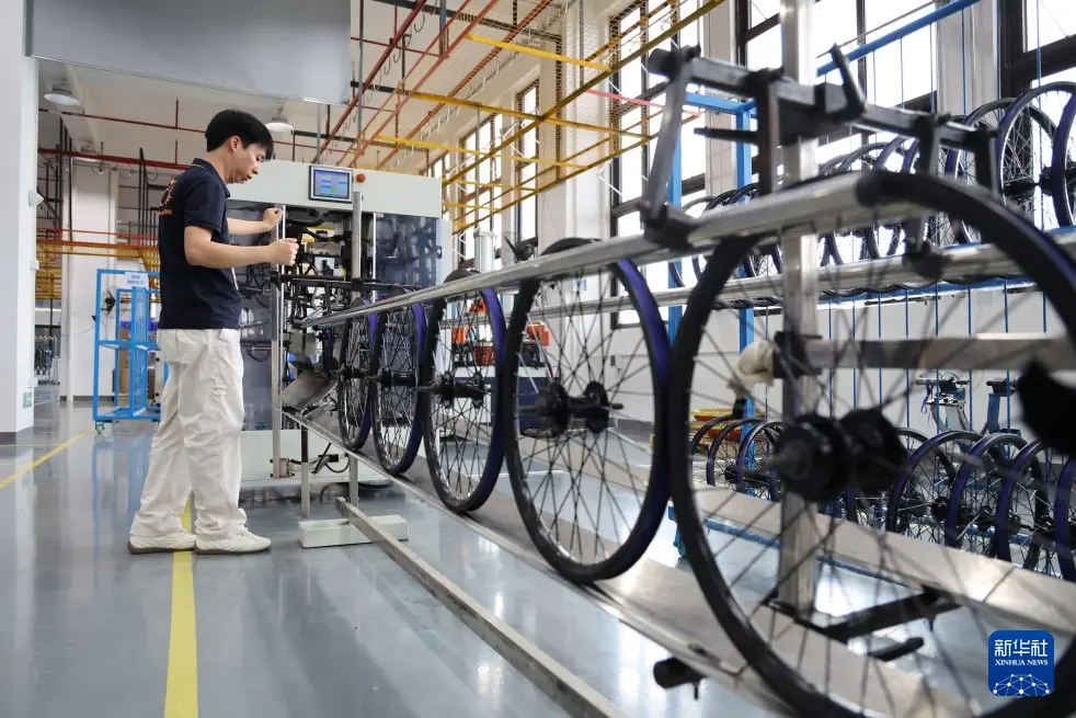 活力中国调研行｜AI遇上E-Bike 智慧骑行更轻松（组图）