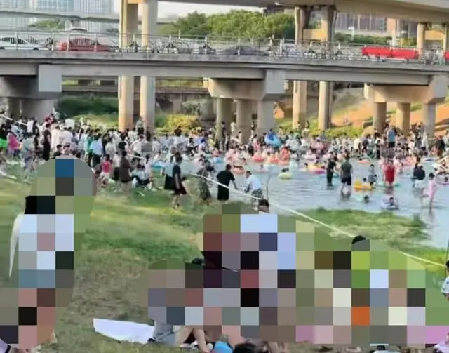 郑州“入河排污口”成免费戏水乐园？管理方：排放的中水水质达标，但中水再清澈也是中水，曾多次劝阻劝不住